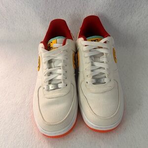 Nike  White Sneakers with Red and Yellow Details